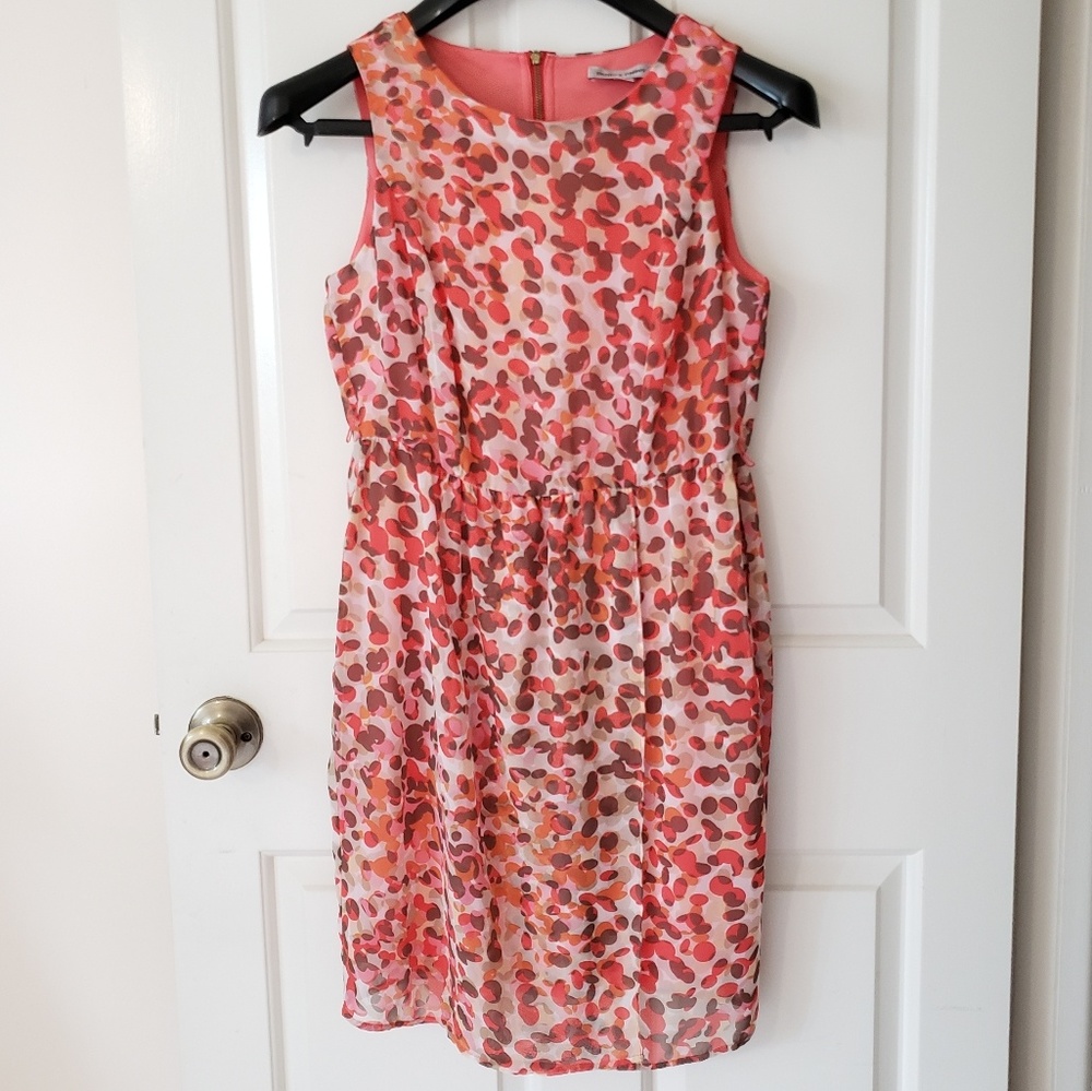 Cute sleveless, rosy-salmon colored printed dress